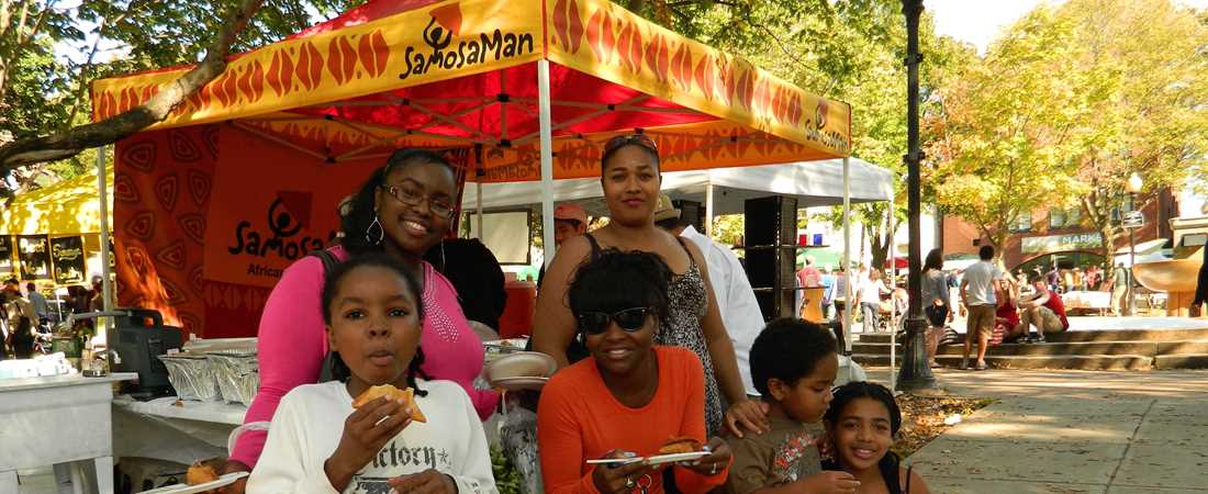 family enjoying samosas